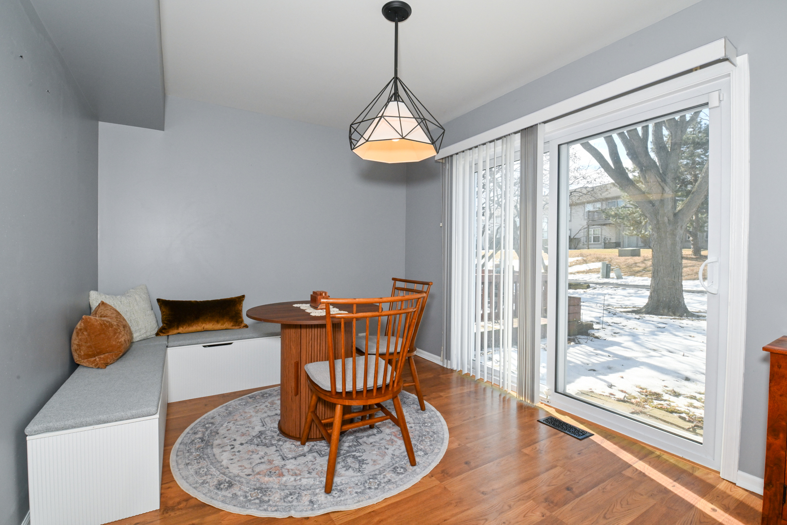 2092 Muirfield Circle Elgin, IL 60123 - Photo 5 of 14 a dining room with a glass table and chairs