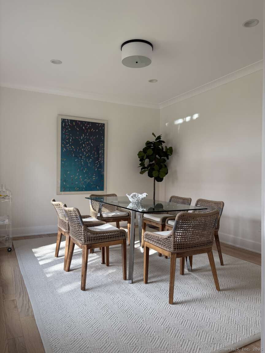 137 Millard Street Fairfield, CT 06824 - Photo 6 of 19 a view of a workspace with furniture