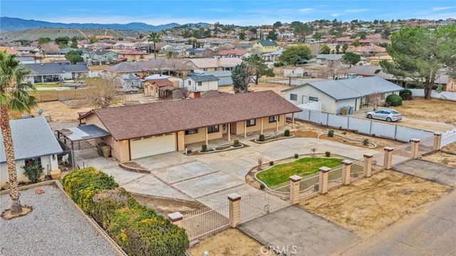 an aerial view of residential houses and lake view