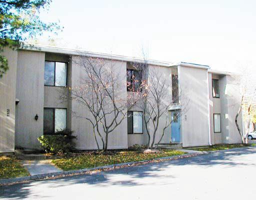 49 Olcott Way, Unit 492 Ridgefield, CT 06877 - Photo 1 of 1 a view of a house with a yard