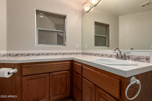 a bathroom with a shower and toilet