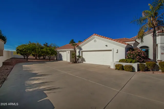 a view of a house with a outdoor space and street view