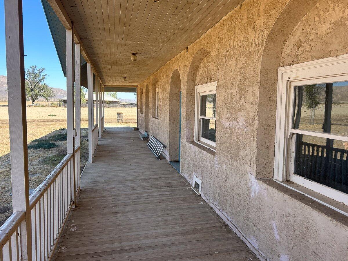 166 Russell Ranch Highway Cuyama, CA 93254 - Photo 7 of 28 a view of a house with wooden floor