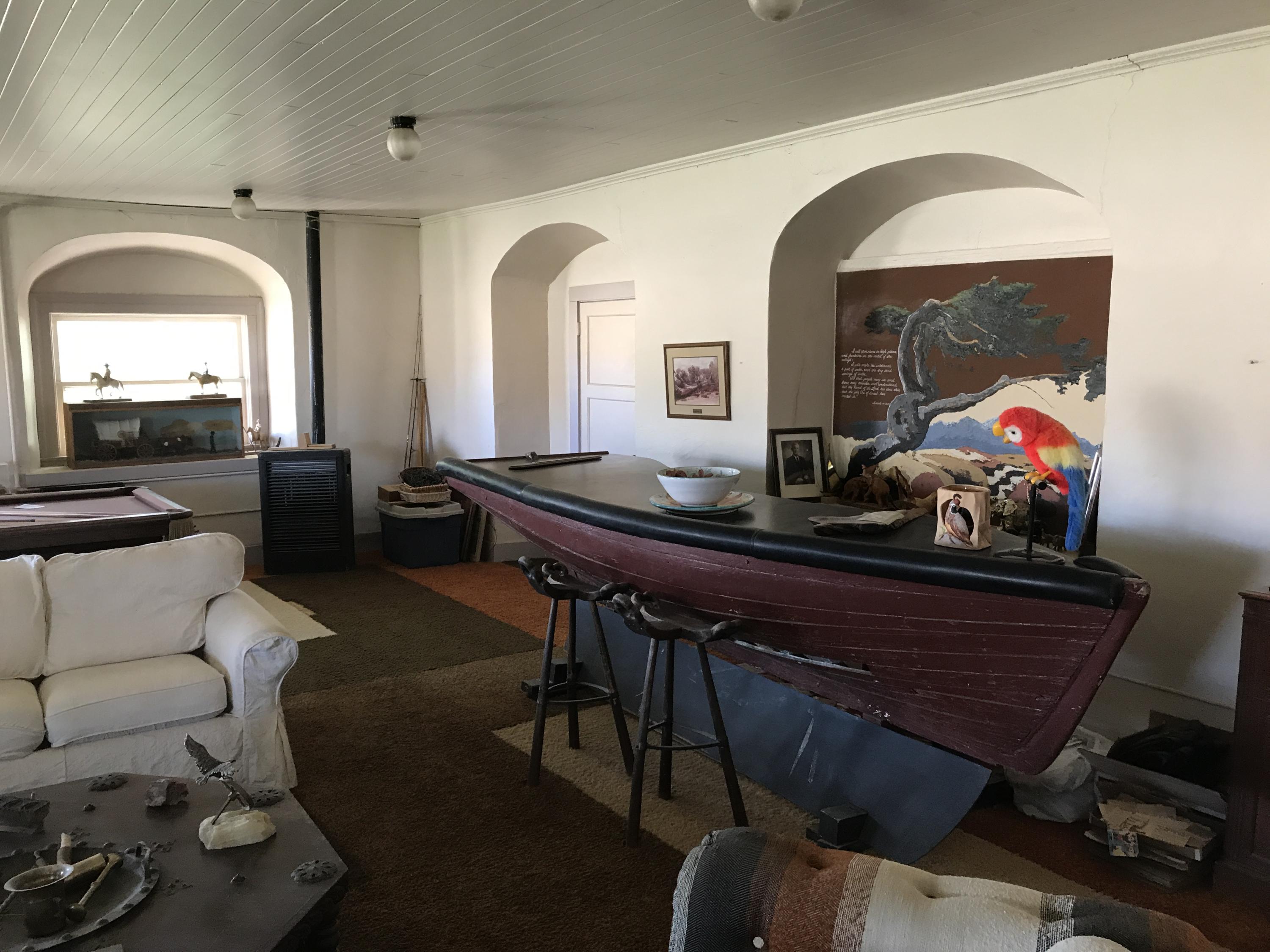 166 Russell Ranch Highway Cuyama, CA 93254 - Photo 8 of 28 a living room with furniture a rug and a mirror