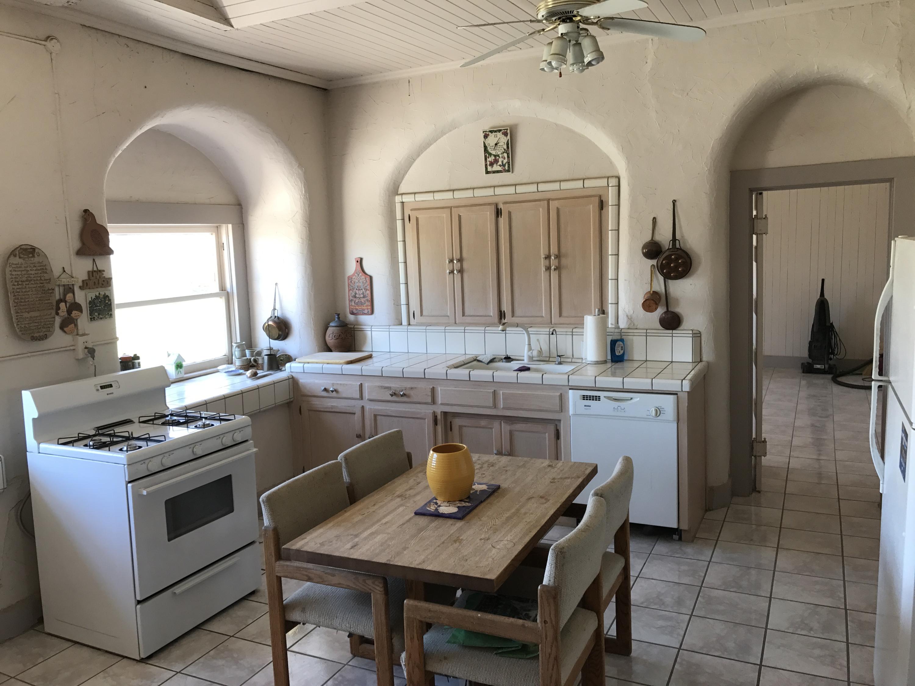 166 Russell Ranch Highway Cuyama, CA 93254 - Photo 10 of 28 a kitchen with a sink stove and cabinets