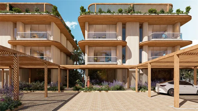 a view of a building with car parked