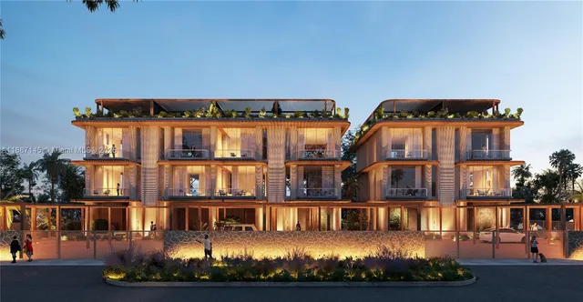 an outdoor view of a house with wooden floor