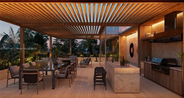 a view of a patio with table and chairs