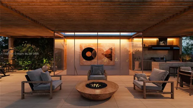 a kitchen with a table and chairs