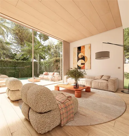 a bedroom with furniture and large windows