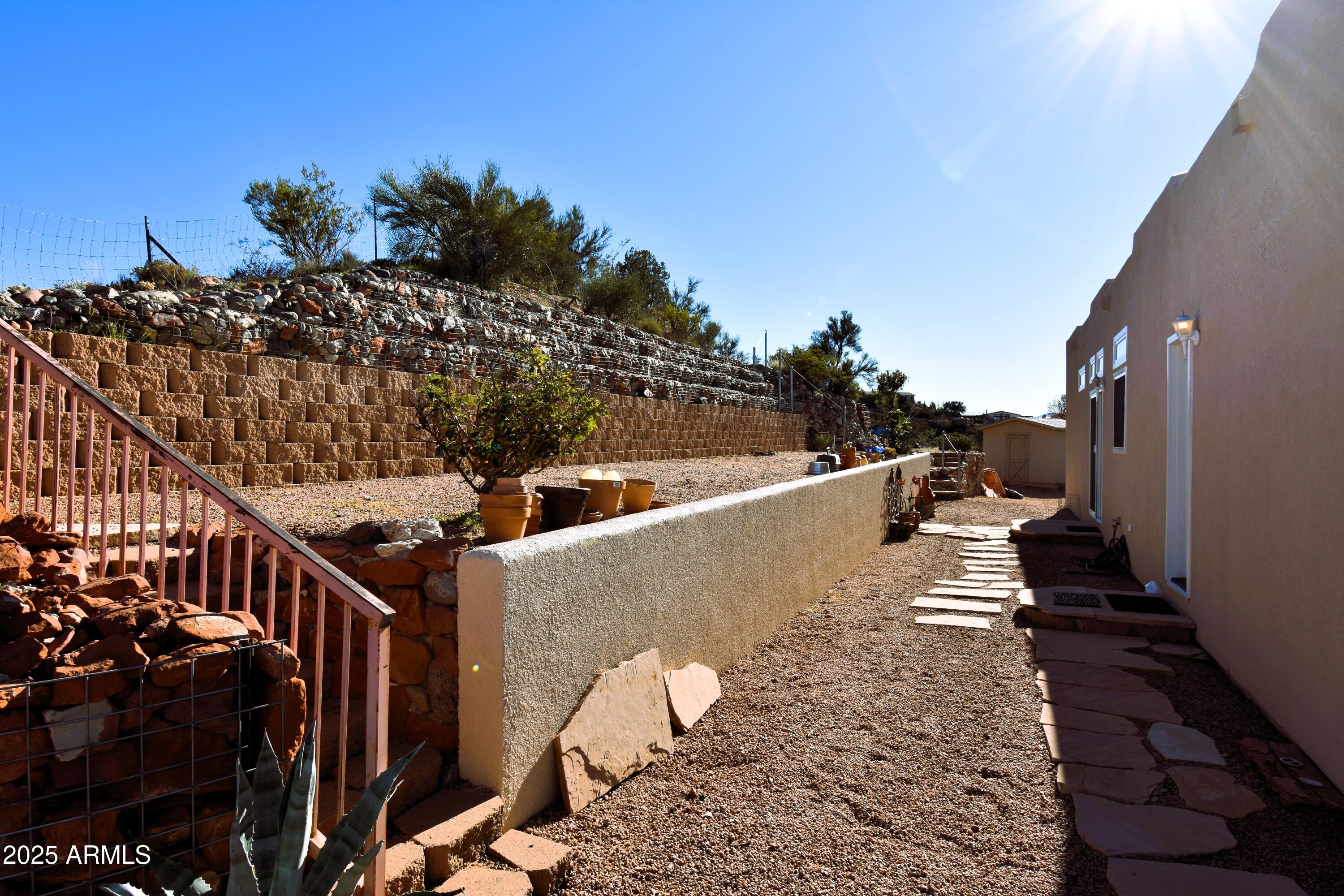 4665 Lazy Lariat Lane Rimrock, AZ 86335 - Photo 21 of 29 a view of a balcony with wooden floor and outdoor space