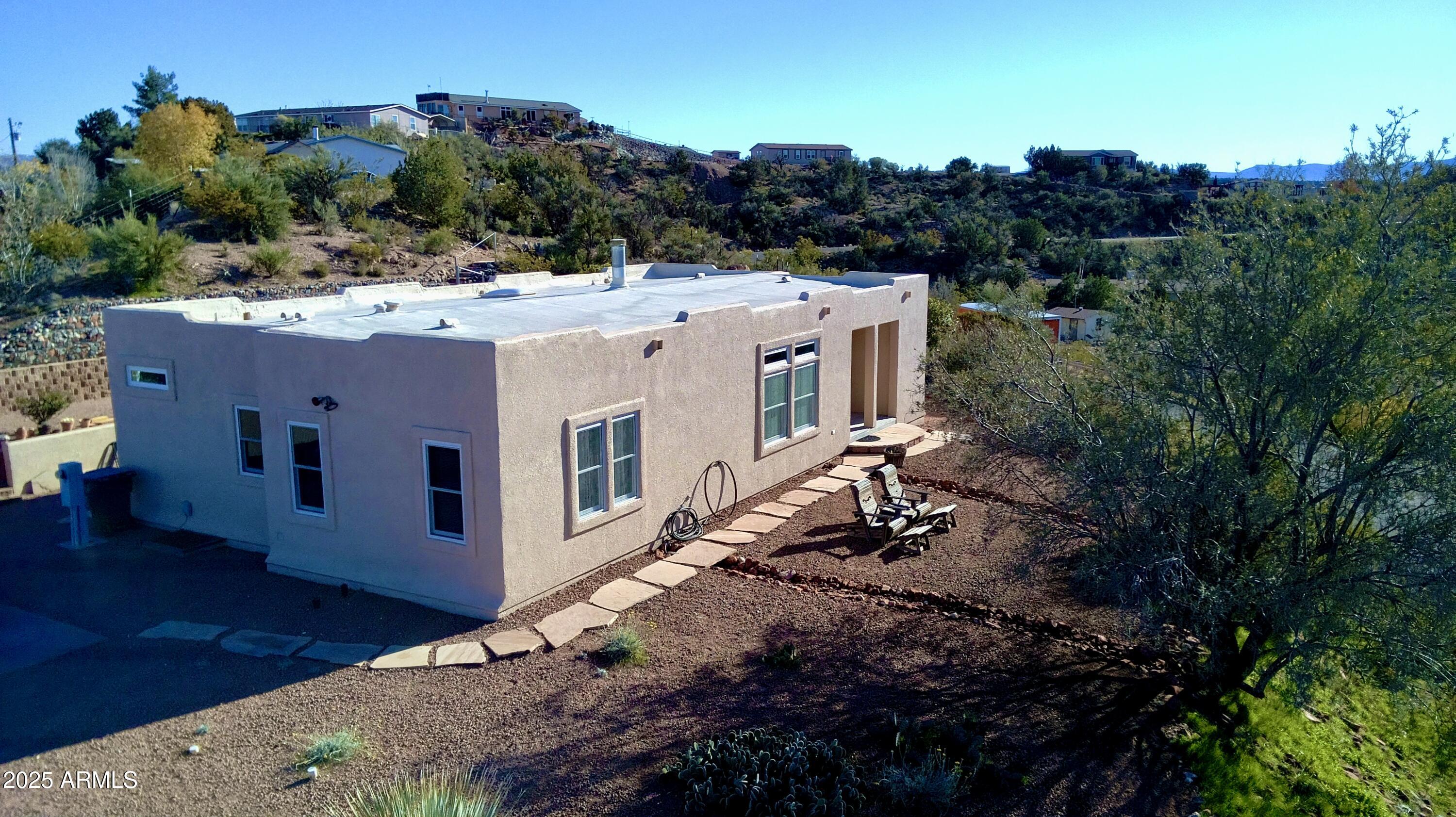 4665 Lazy Lariat Lane Rimrock, AZ 86335 - Photo 28 of 29 a view of a house with a yard