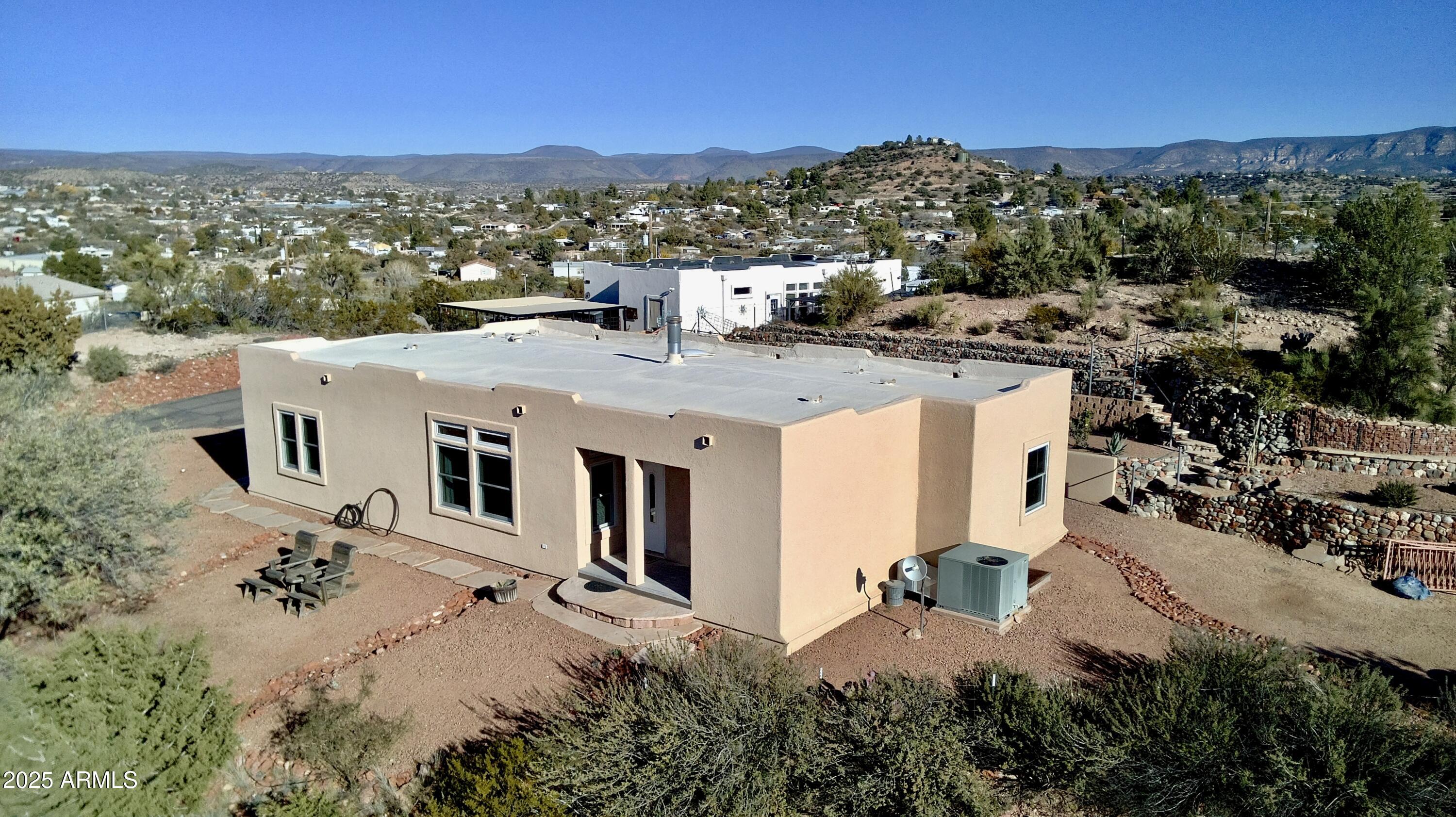 4665 Lazy Lariat Lane Rimrock, AZ 86335 - Photo 29 of 29 an aerial view of residential houses with outdoor space and trees