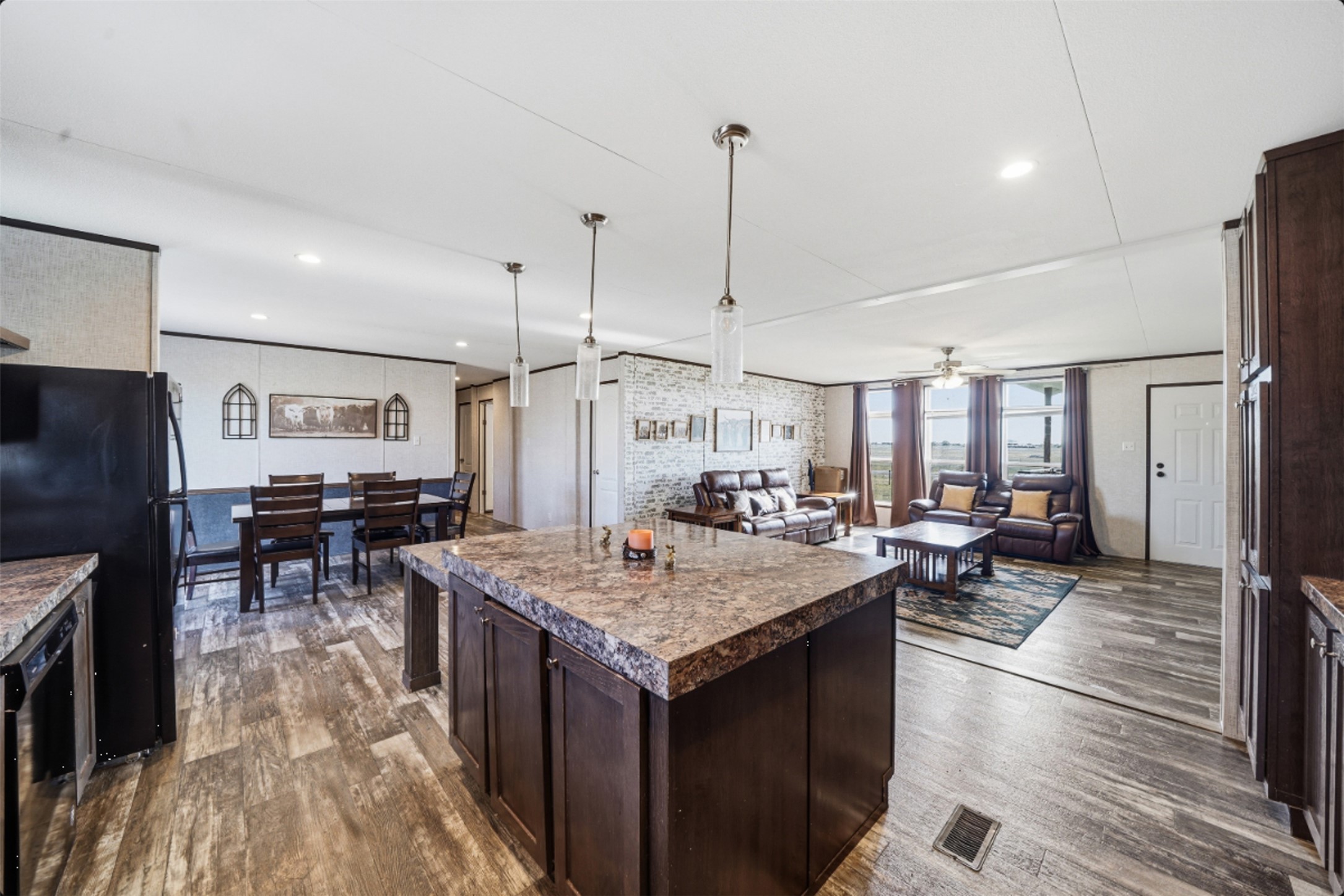 2493 County Road 464 Elgin, TX 78621 - Photo 40 of 40 a open kitchen with stainless steel appliances granite countertop a stove and refrigerator