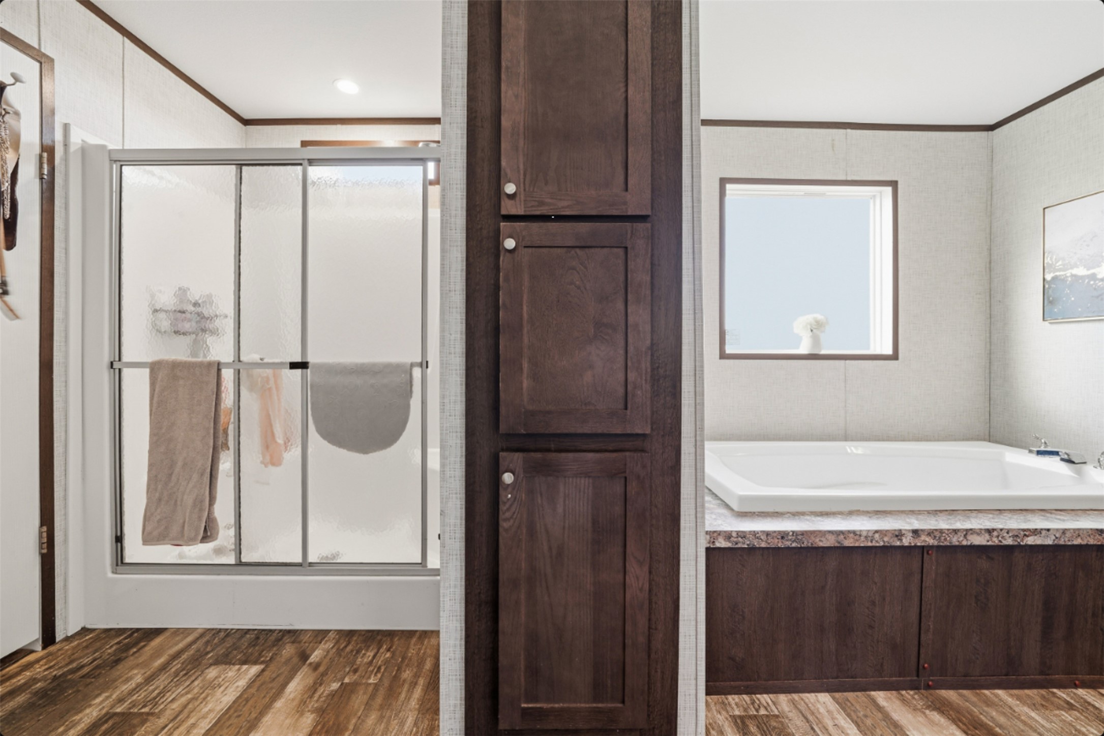 2493 County Road 464 Elgin, TX 78621 - Photo 20 of 40 a bathroom with a tub and a shower