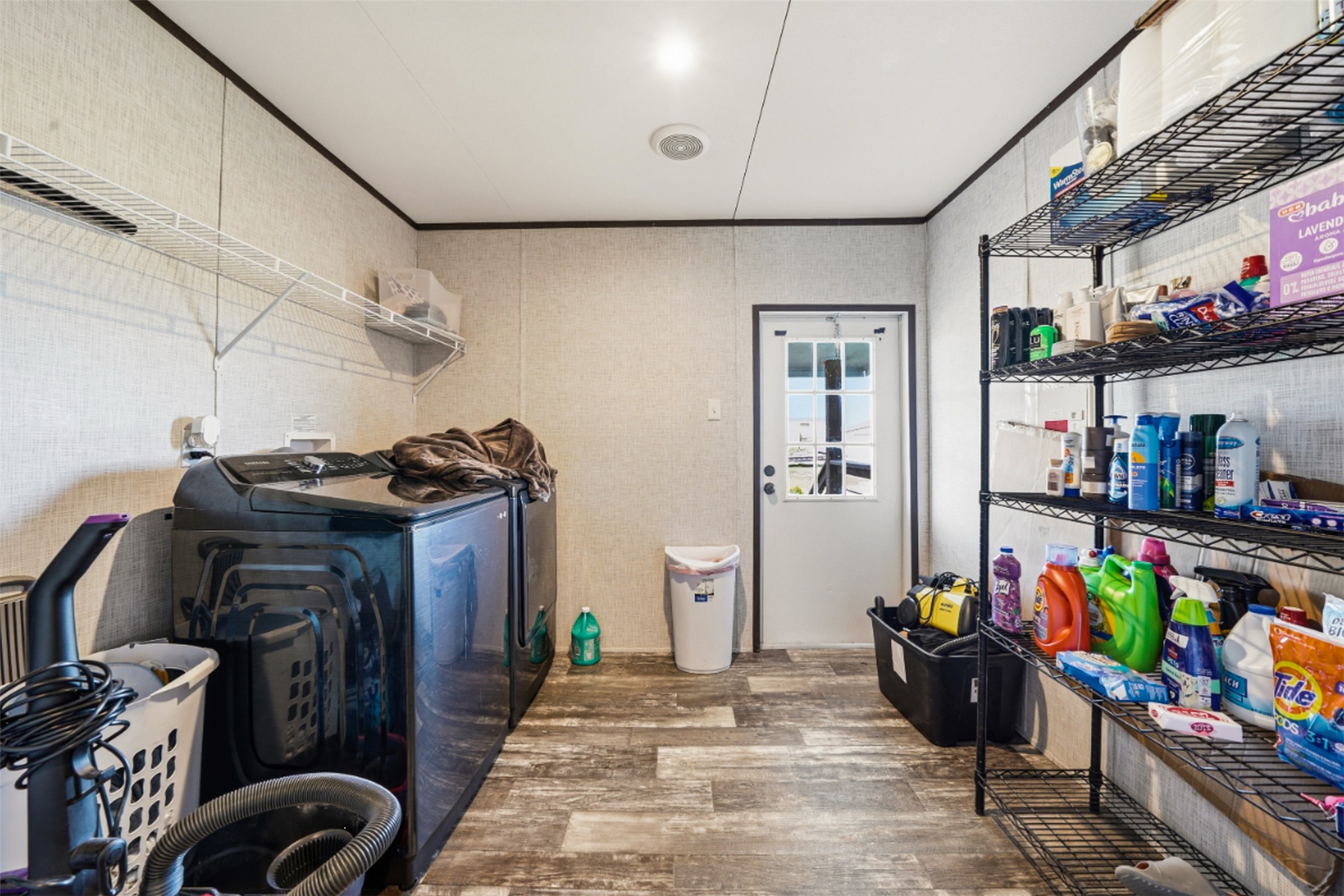 2493 County Road 464 Elgin, TX 78621 - Photo 25 of 40 a view of storage and utility room