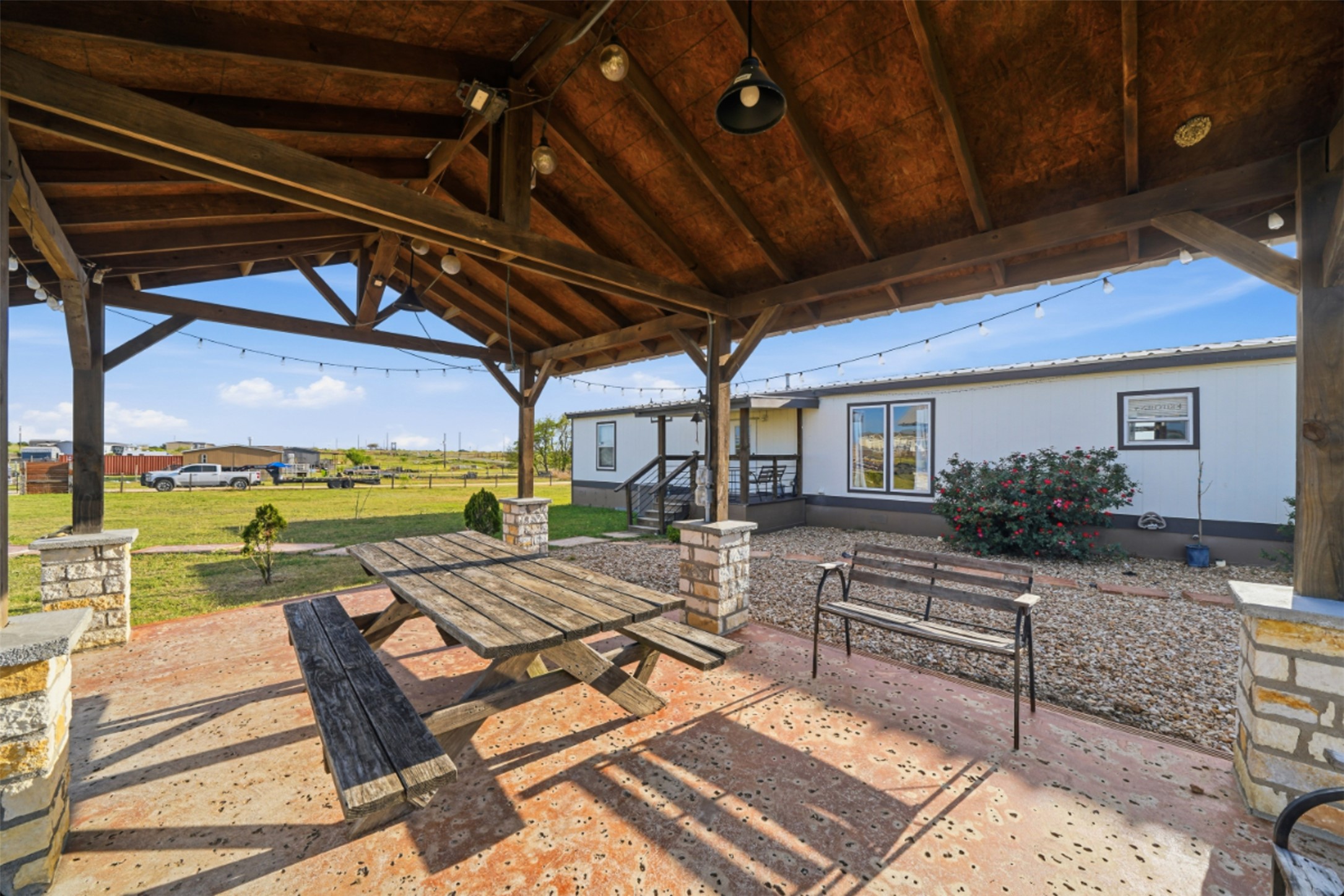 2493 County Road 464 Elgin, TX 78621 - Photo 27 of 40 a view of a patio with swimming pool