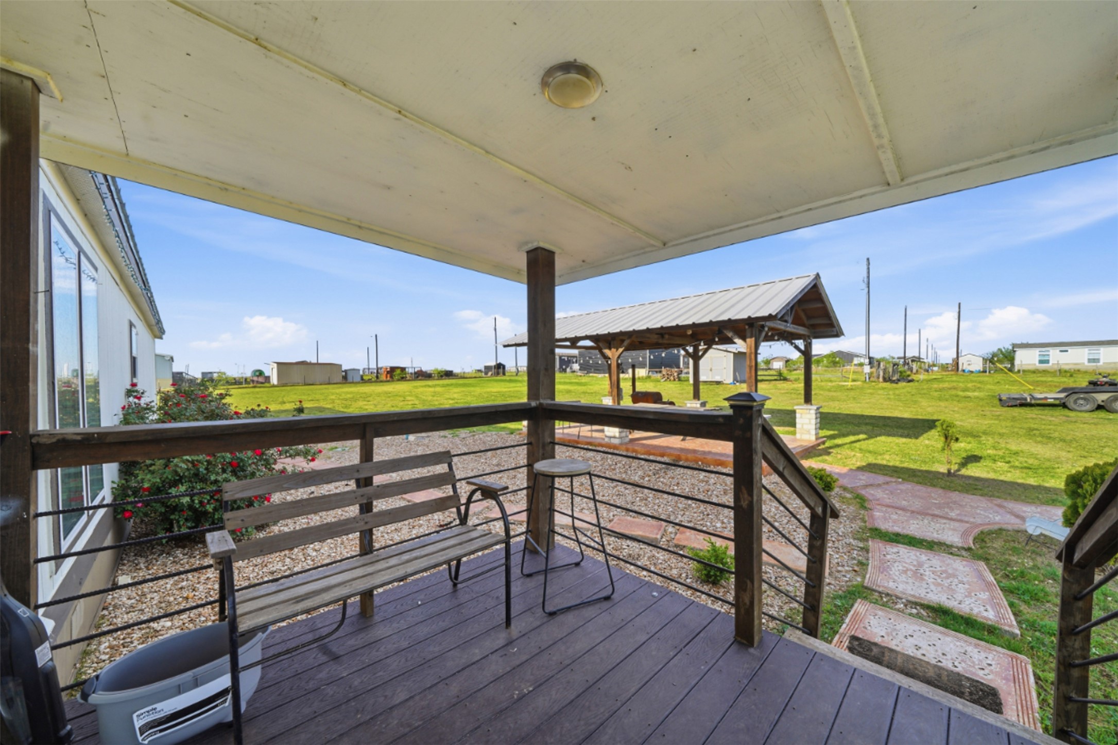2493 County Road 464 Elgin, TX 78621 - Photo 4 of 40 a view of a balcony with chairs