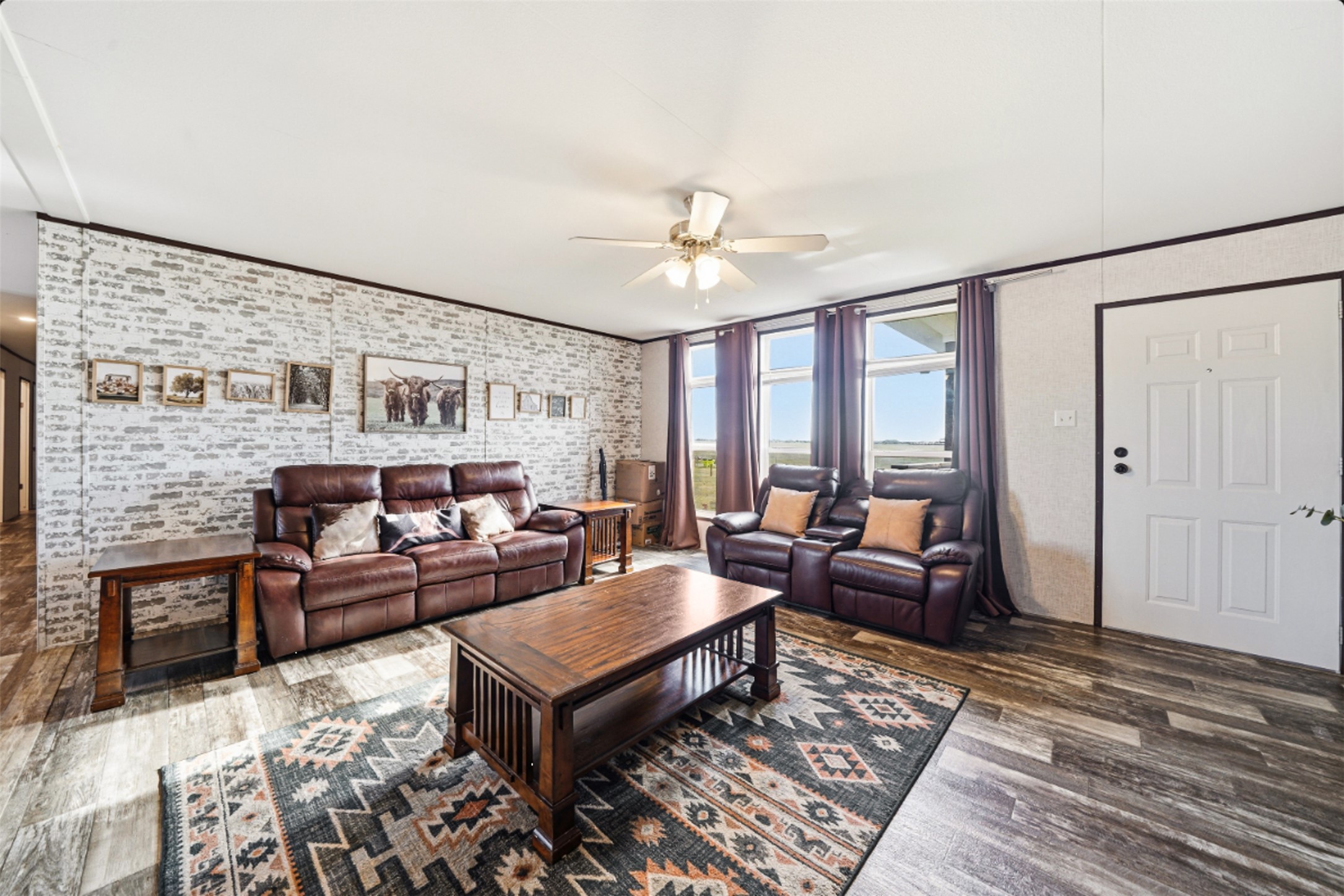 2493 County Road 464 Elgin, TX 78621 - Photo 6 of 40 a living room with furniture and a fireplace