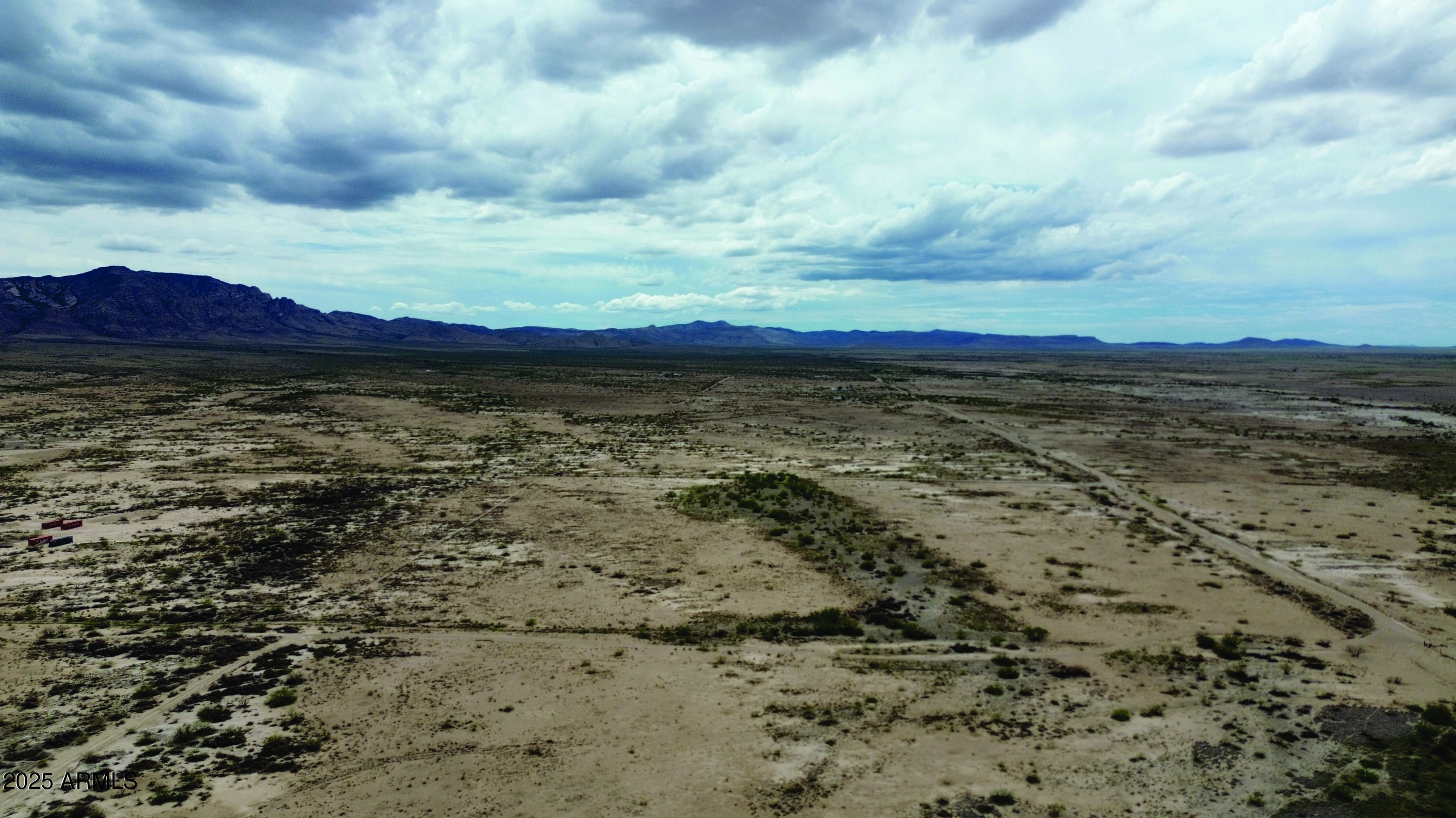 40.98-acre East Many Wells Road, Unit 32 San Simon, AZ 85632 - Photo 9 of 31 a view of an ocean beach and mountain
