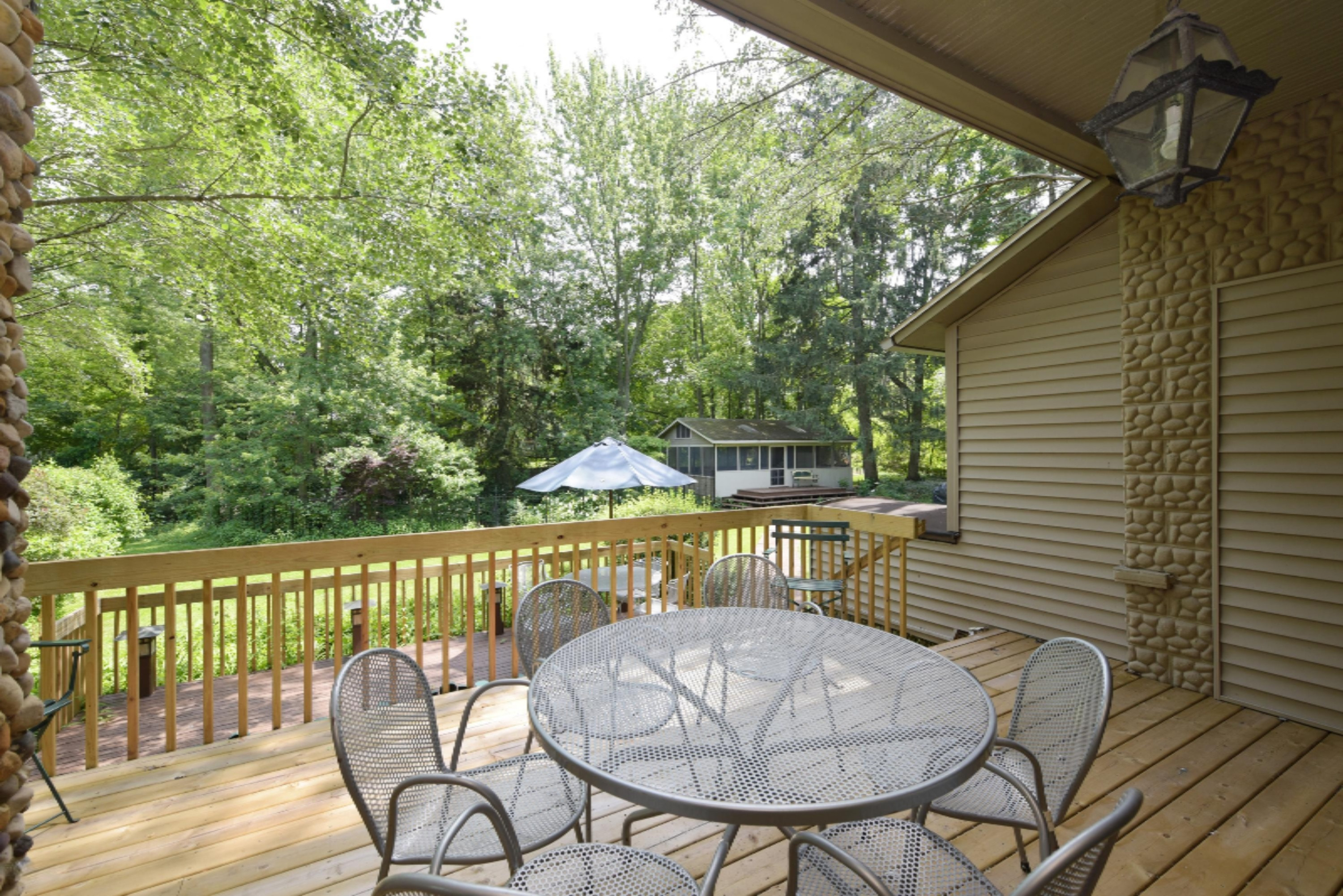 15093 Lakeshore Road Lakeside, MI 49116 - Photo 3 of 31 12_15093LakeshoreRoad_66_Deck_HiRes