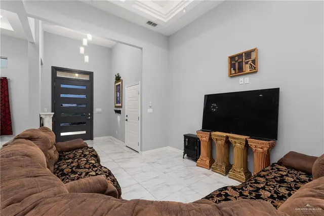 a bedroom with bed and walk in closet