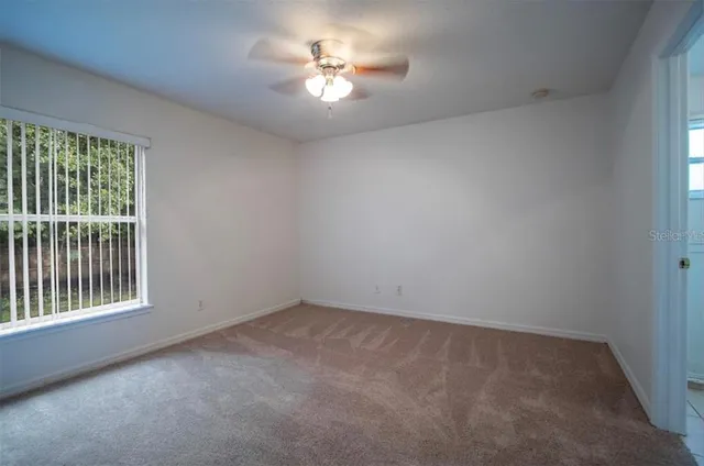 an empty room with a bathroom