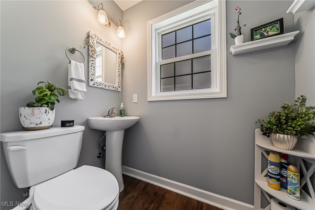 3684 Fenley Road Cleveland Heights, OH 44121 - Photo 10 of 38 Half bathroom featuring baseboards and wood finished floors