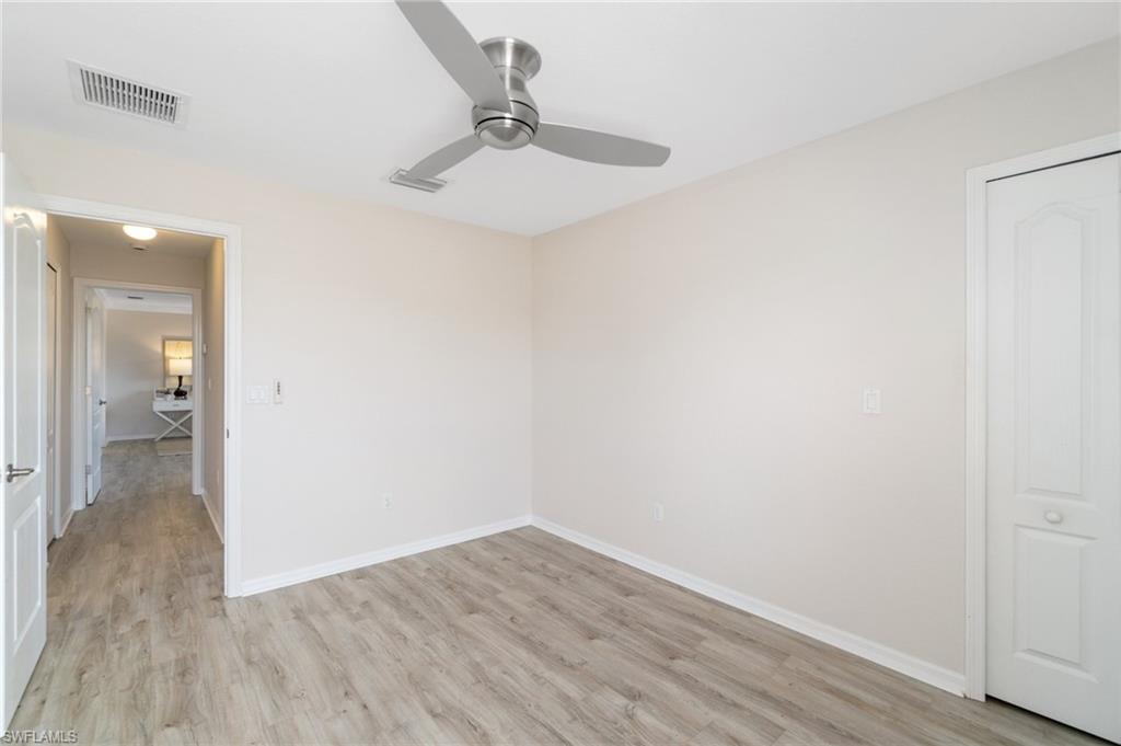 21017 Bella Terra Boulevard Estero, FL 33928 - Photo 28 of 45 a view of a room with wooden floor