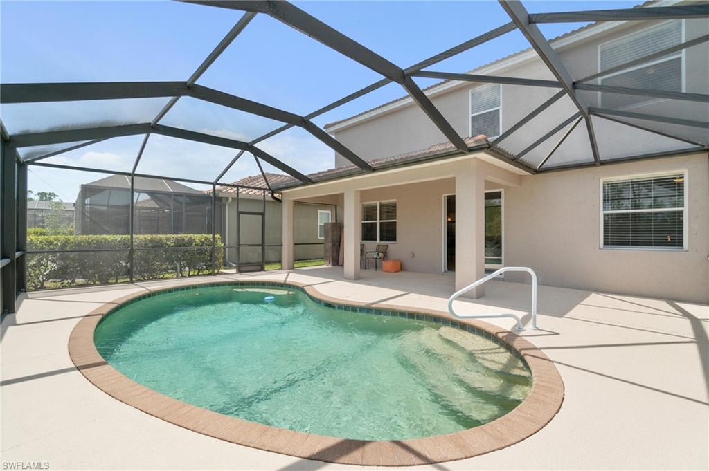 21017 Bella Terra Boulevard Estero, FL 33928 - Photo 32 of 45 a swimming pool with view of outdoor seating