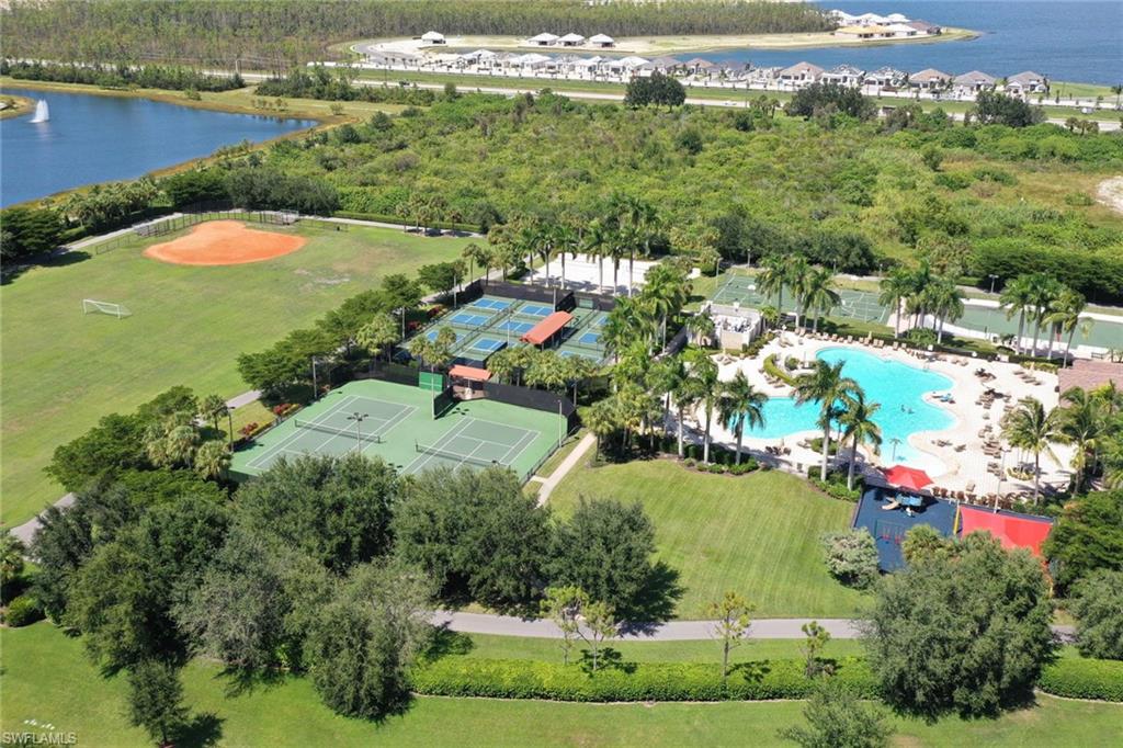 21017 Bella Terra Boulevard Estero, FL 33928 - Photo 40 of 45 an aerial view of lake residential houses with outdoor space and swimming pool