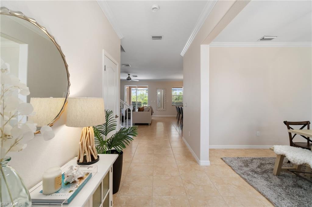 21017 Bella Terra Boulevard Estero, FL 33928 - Photo 6 of 45 a living room with furniture and wooden floor