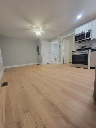 a view of kitchen and microwave