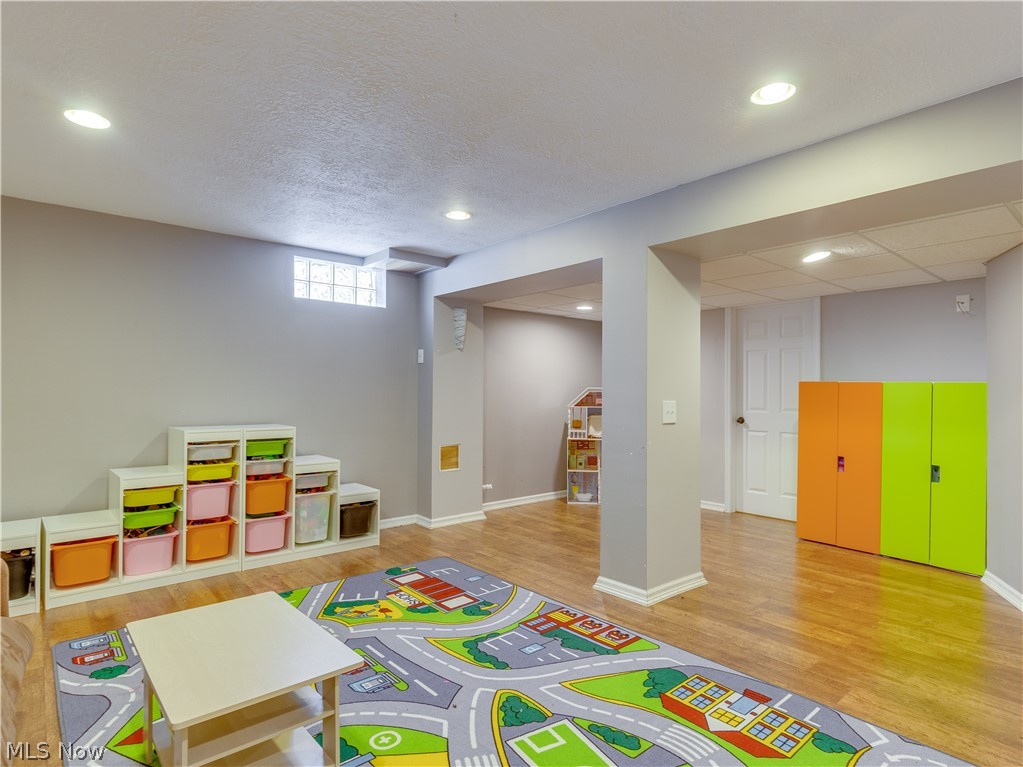 1794 Summerchase Road Northeast Canton, OH 44721 - Photo 31 of 32 Finished area of the lower level with wood look floors