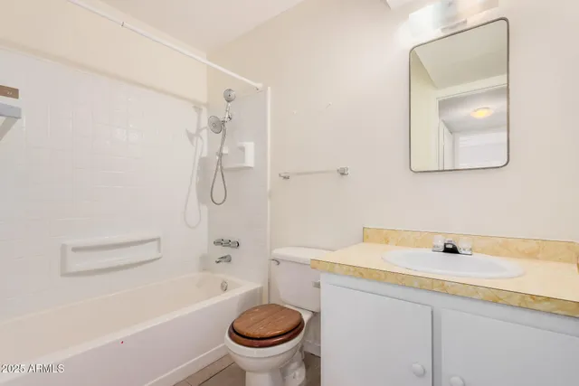 a bathroom with a sink a toilet and a bathtub