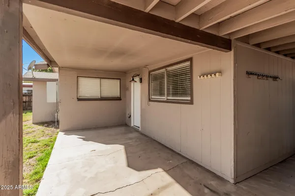 a view of hallway with furniture
