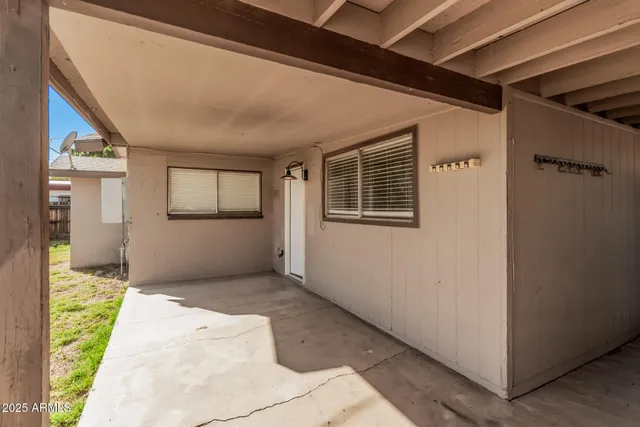 a view of hallway with furniture