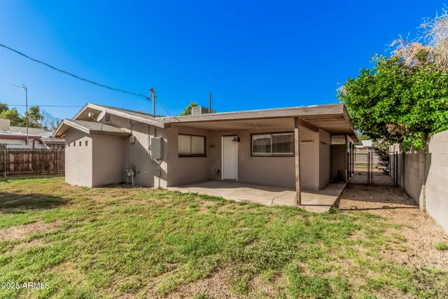 a house with trees in front of it