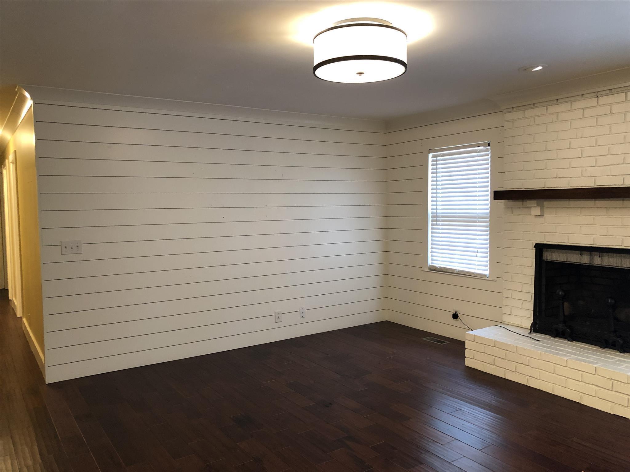 208 Riggs Avenue Portland, TN 37148 - Photo 14 of 26 Great accent wall in the family room