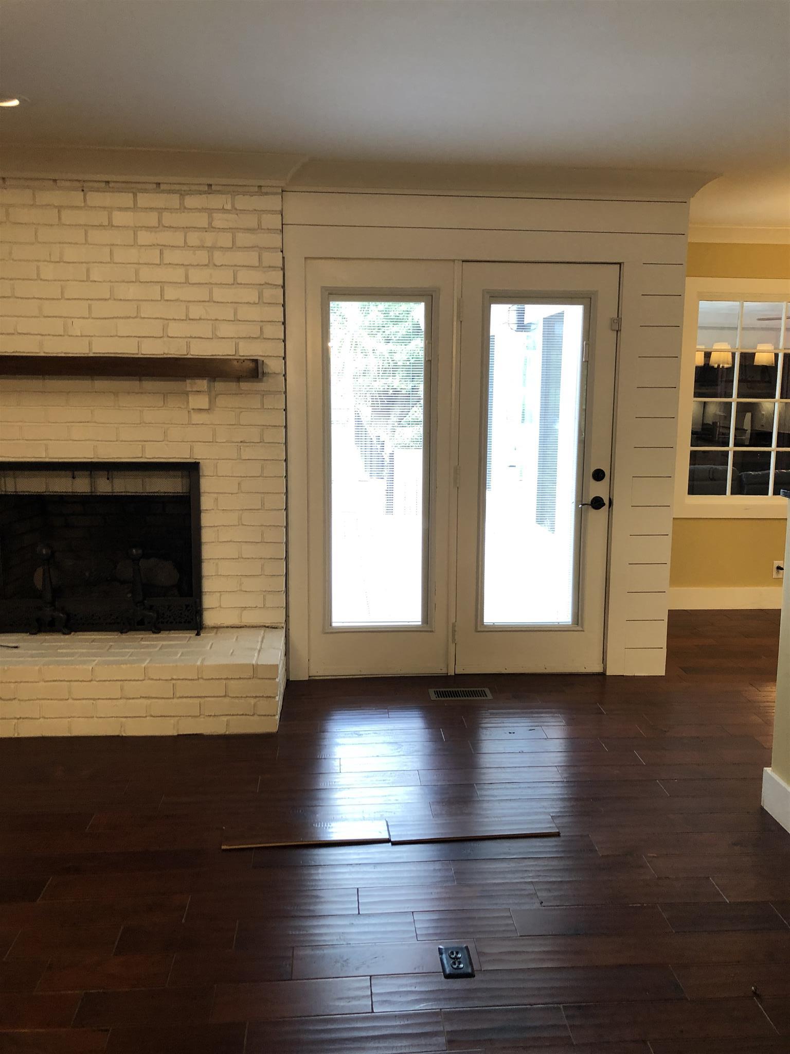 208 Riggs Avenue Portland, TN 37148 - Photo 15 of 26 Double doors leading to the deck