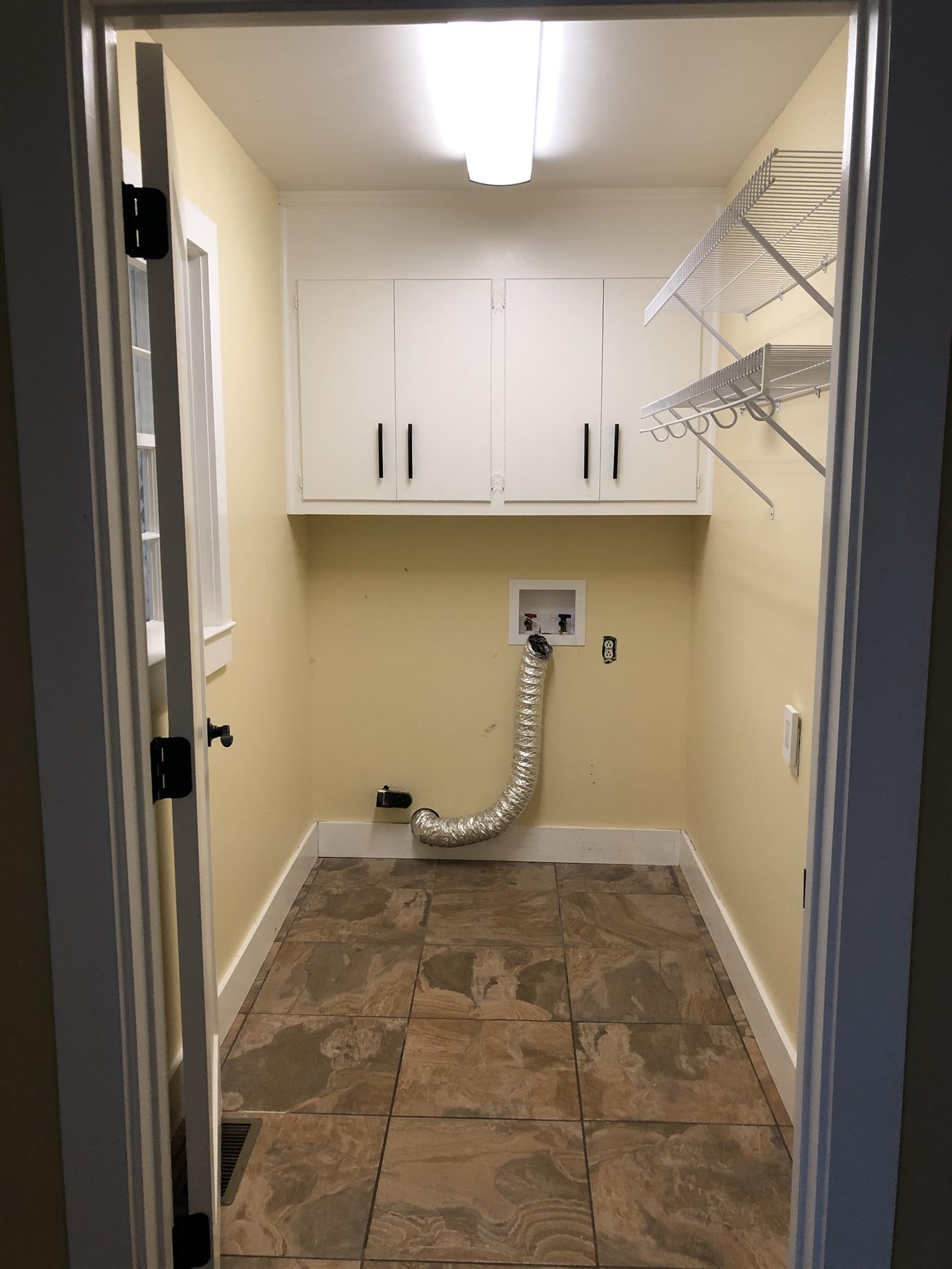 208 Riggs Avenue Portland, TN 37148 - Photo 17 of 26 Nice big utility room right off the kitchen