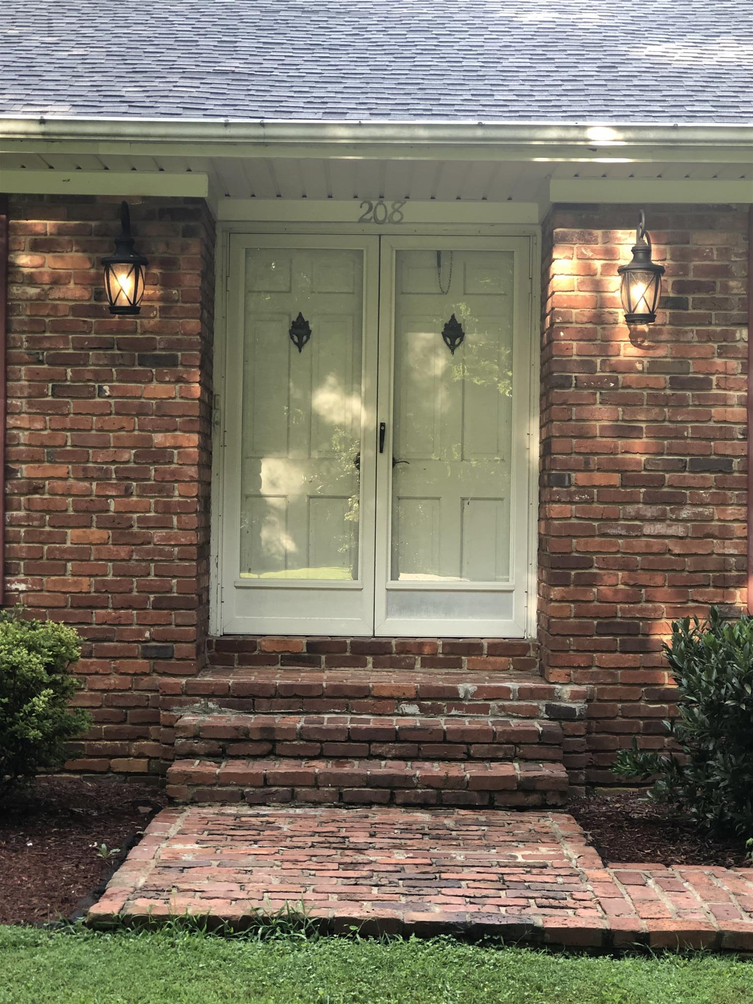 208 Riggs Avenue Portland, TN 37148 - Photo 20 of 26 Double front doors