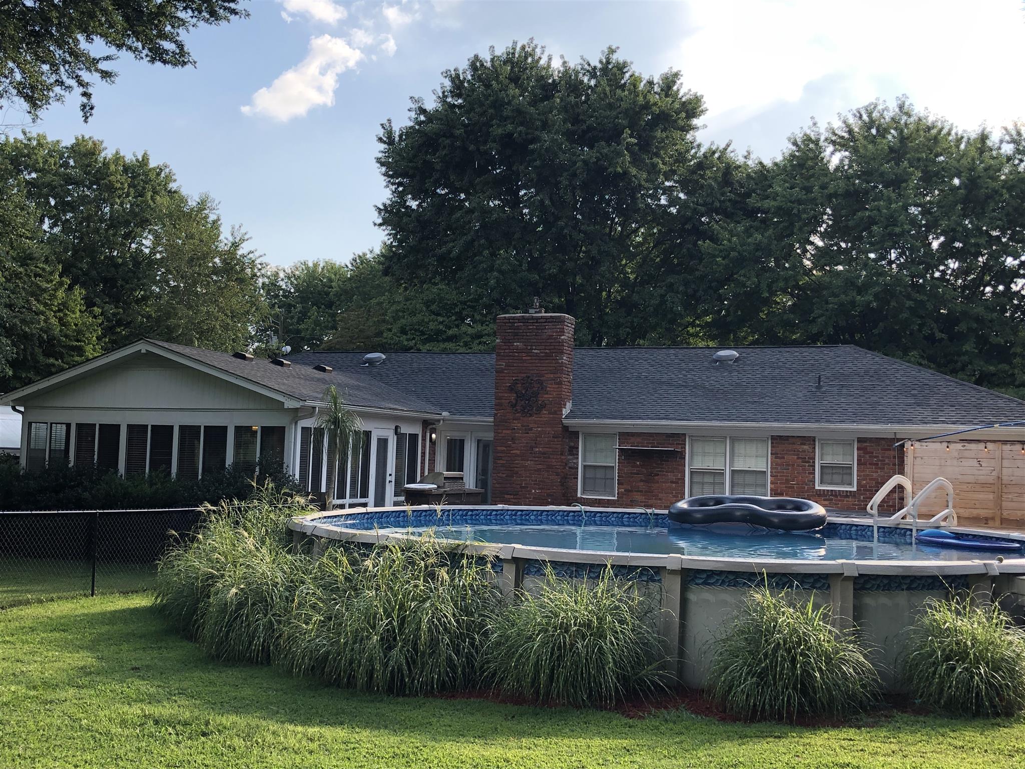 208 Riggs Avenue Portland, TN 37148 - Photo 22 of 26 What a great back yard to enjoy and entertain family and friends!