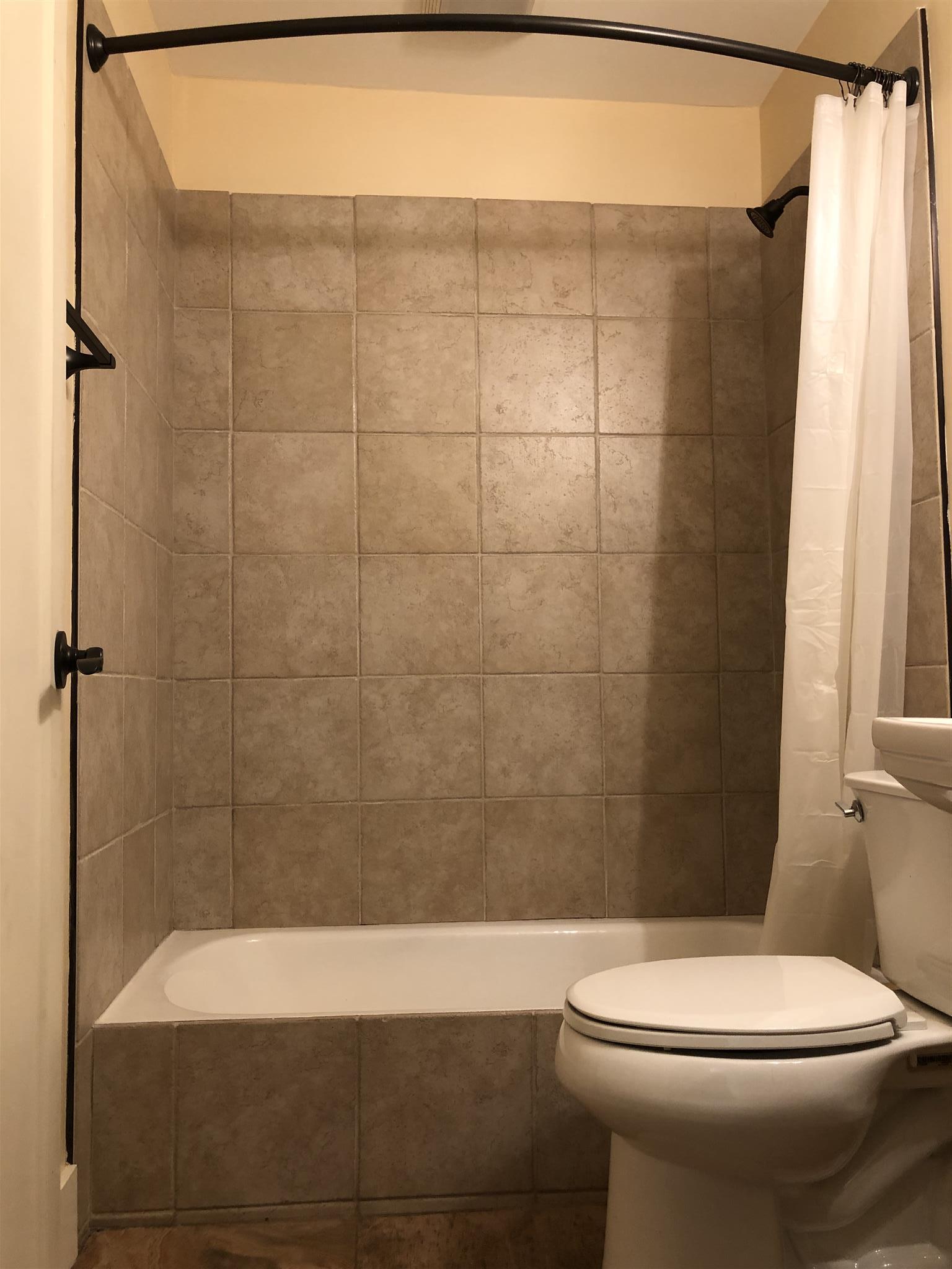 208 Riggs Avenue Portland, TN 37148 - Photo 23 of 26 Full bath with new tile
