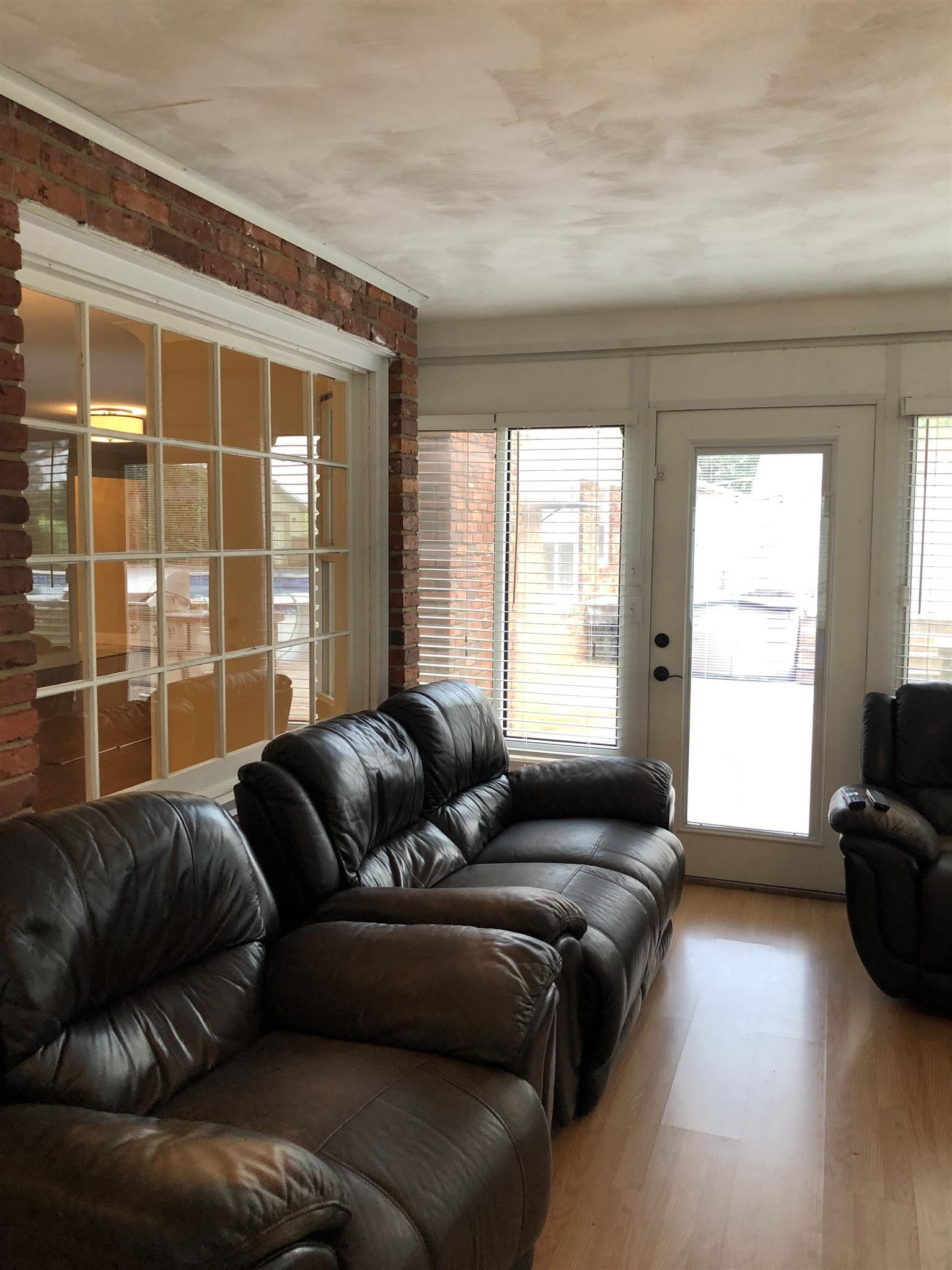 208 Riggs Avenue Portland, TN 37148 - Photo 24 of 26 Sunroom to enjoy year round. Doors on each side to exit to the outdoors.