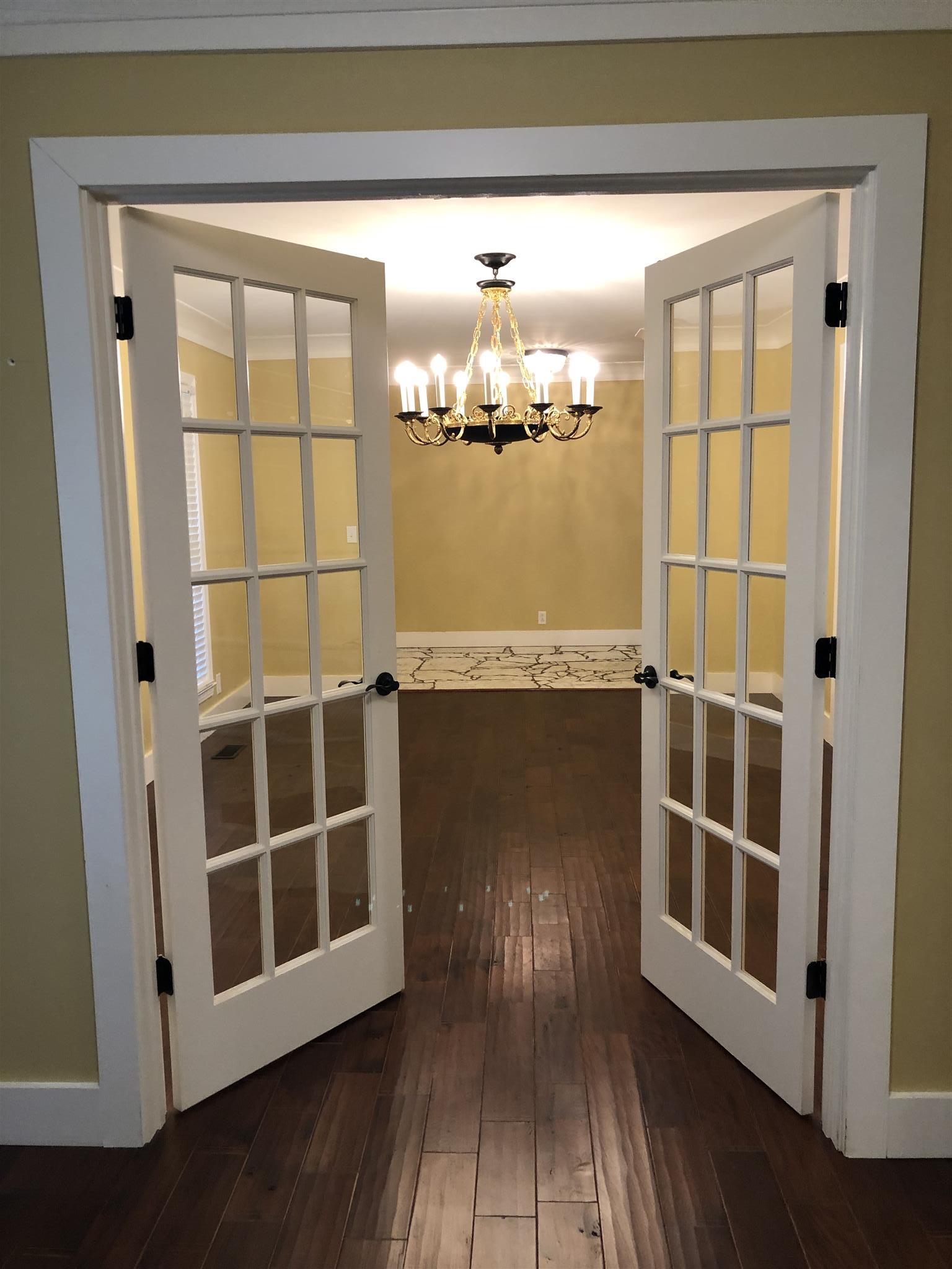 208 Riggs Avenue Portland, TN 37148 - Photo 3 of 26 French doors from the office into the formal dining room