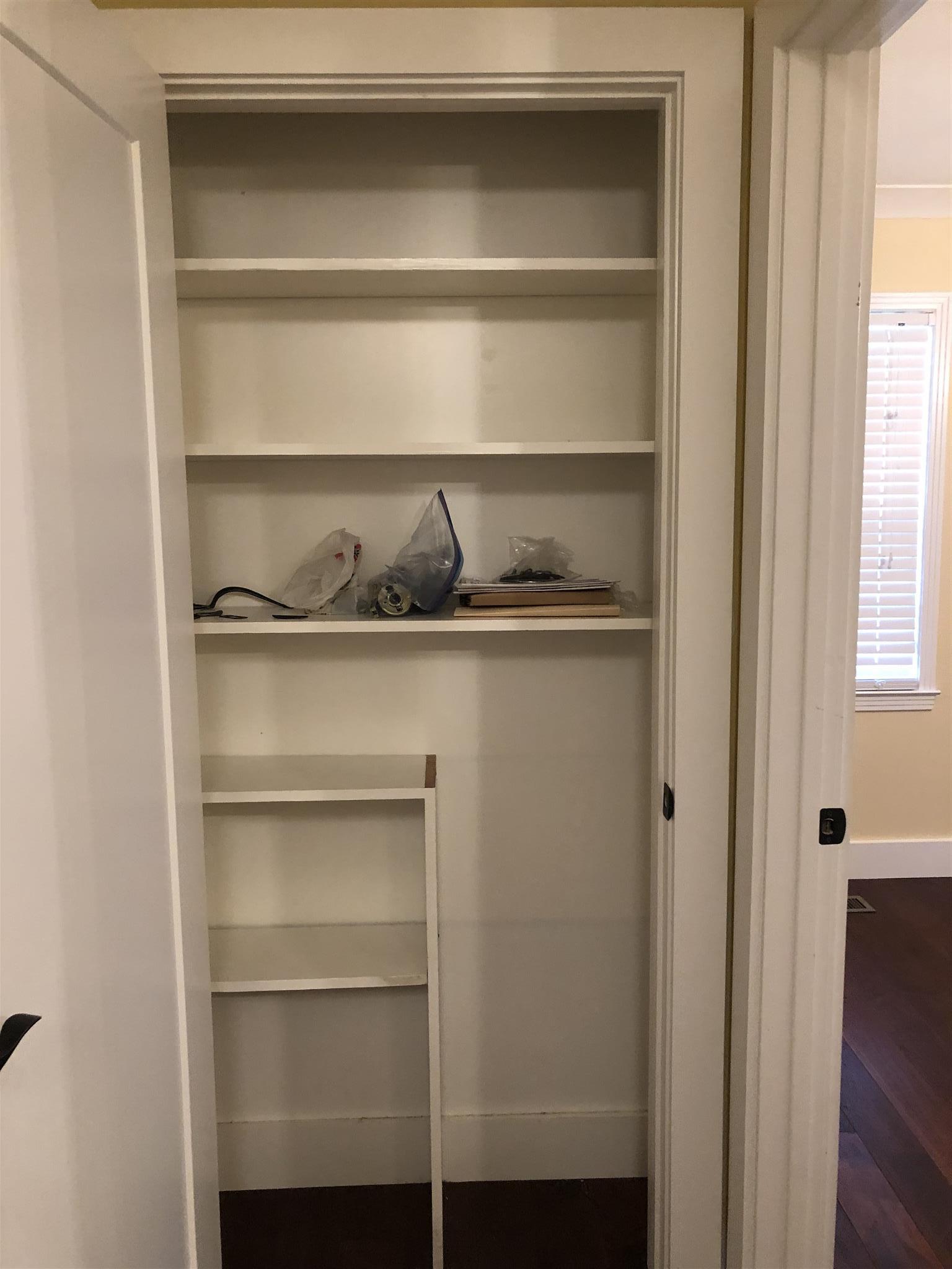 208 Riggs Avenue Portland, TN 37148 - Photo 6 of 26 Large linen closet at the end of the hall