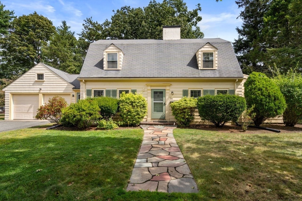 34 Palmer Road Newton, MA 02468 - Photo 1 of 26 a front view of a house with a yard