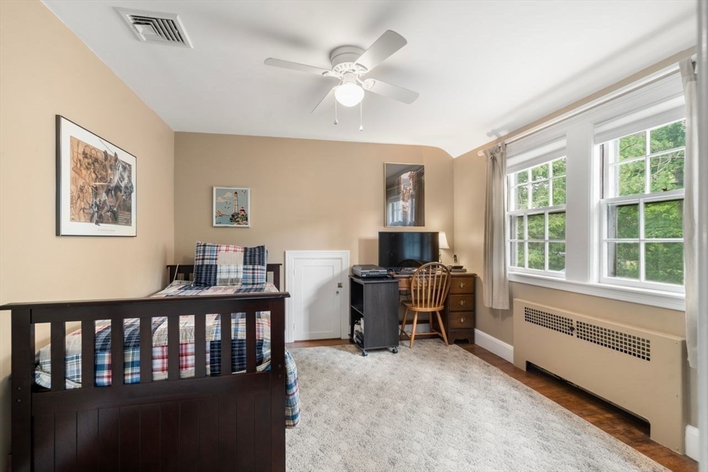 34 Palmer Road Newton, MA 02468 - Photo 19 of 26 a view of a workspace with furniture and a window