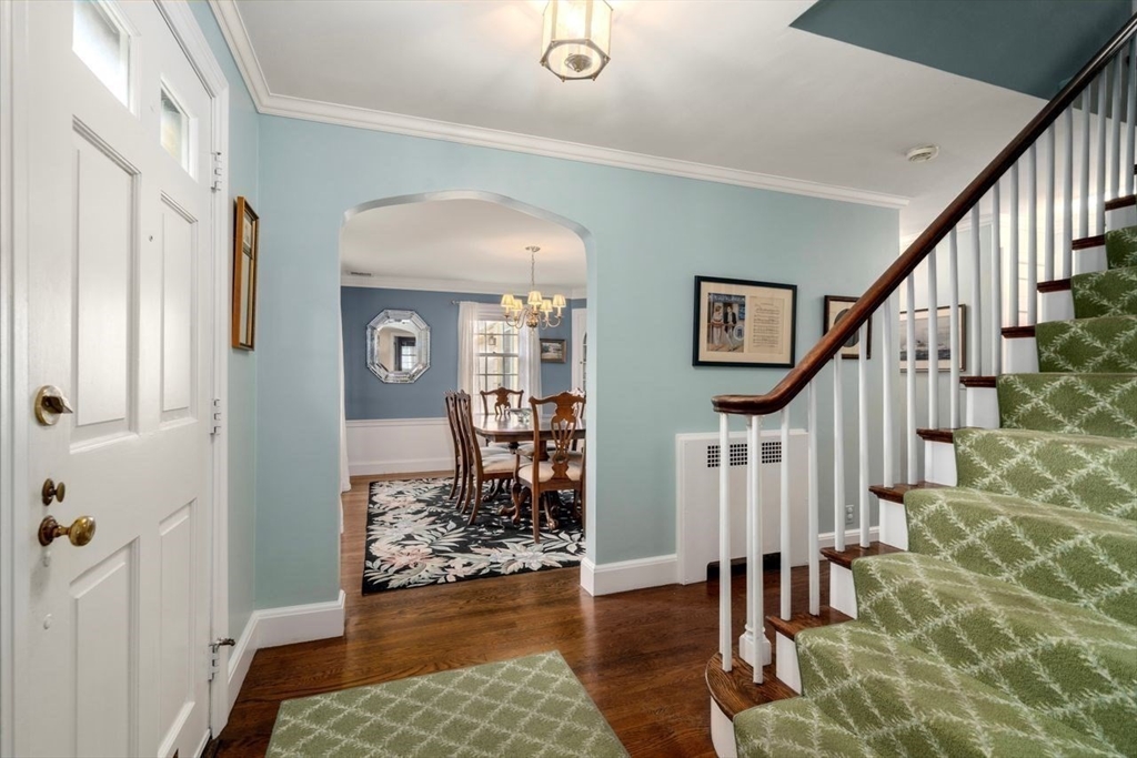 34 Palmer Road Newton, MA 02468 - Photo 3 of 26 a view of entryway with wooden floor and a rug